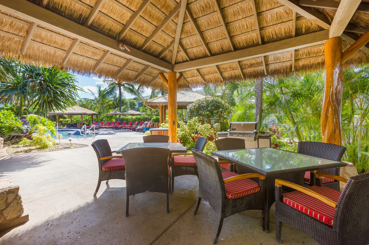 Picture of Outdoor Chairs and Tables by the Pool in our Ko Olina Kai Golf Estates.