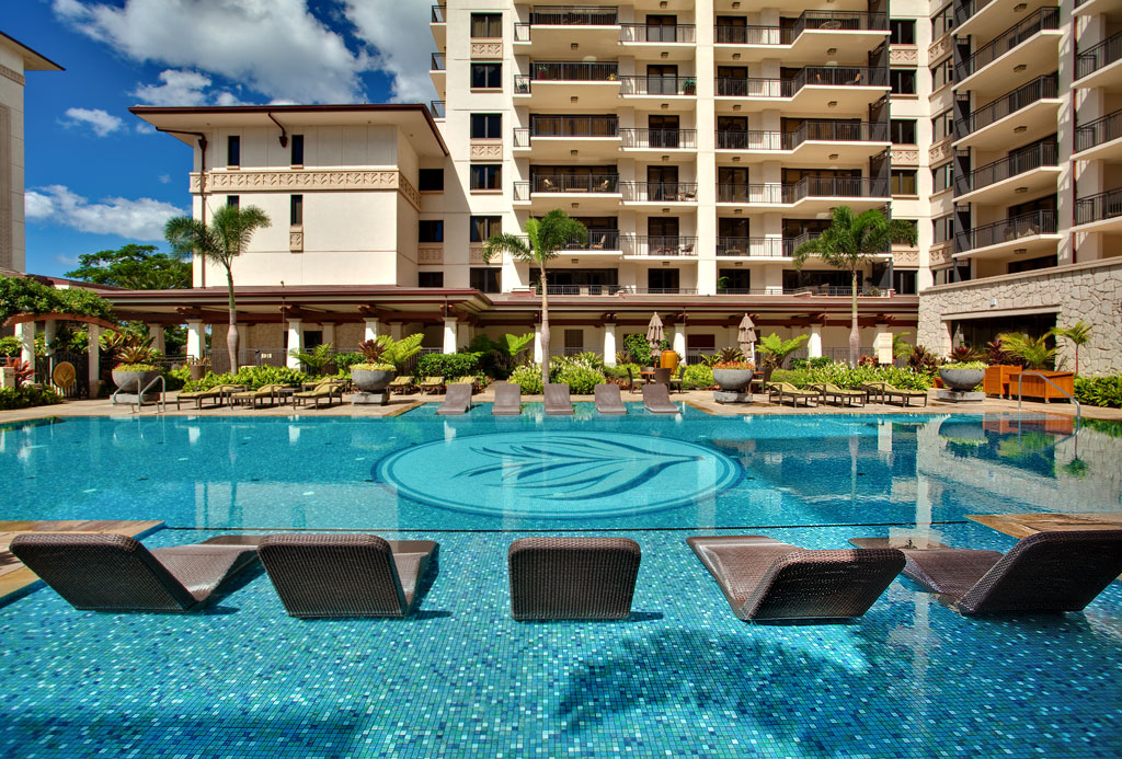 Picture of the Pool with Lounge Chairs in our Hawaii Beach Villa Rentals.