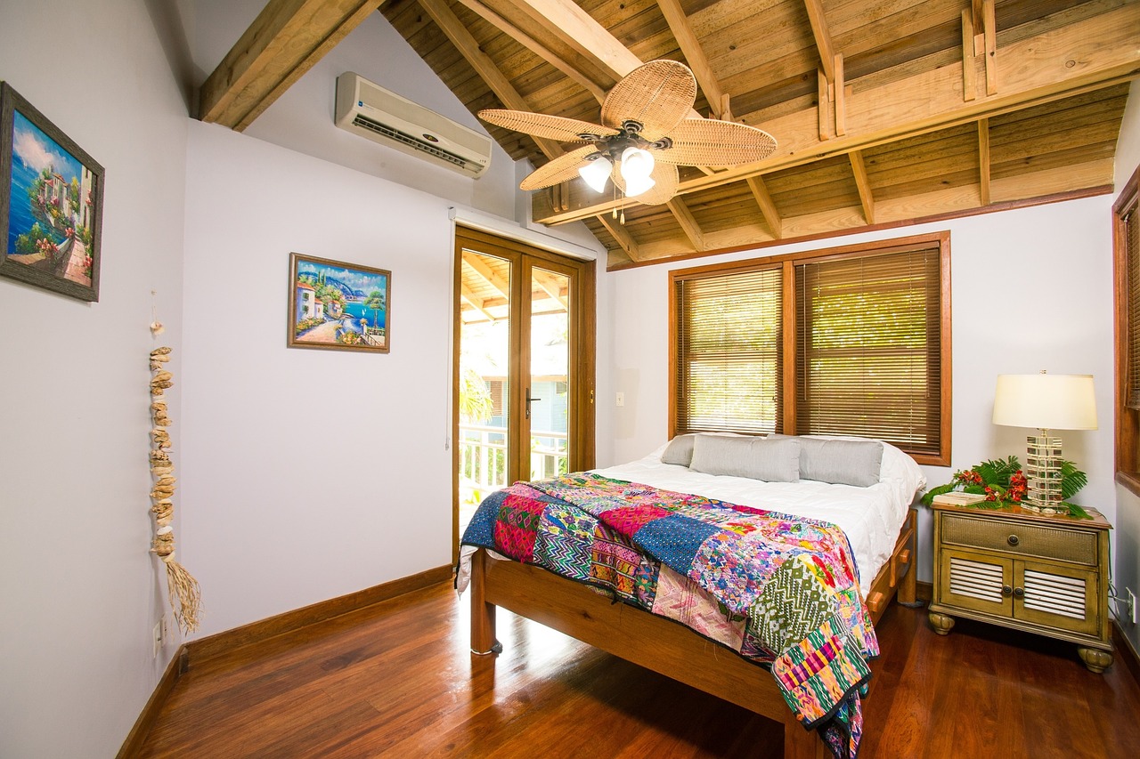 Bedroom with AC of Our Makaha Vacation Homes.