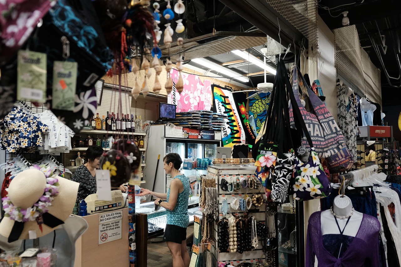 A woman shopping at one of the more cluttered Oahu Local Shops